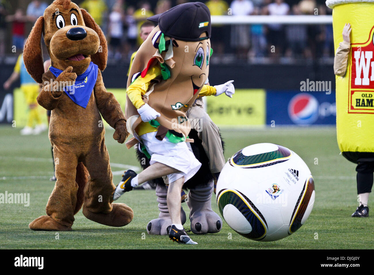 The Subway mascot kicks the ball during the halftime soccer match between  teams of mascots from all of the Crew corporate sponsors. Crew defeated the  Houston Dynamo 3-0 at Crew Stadium in