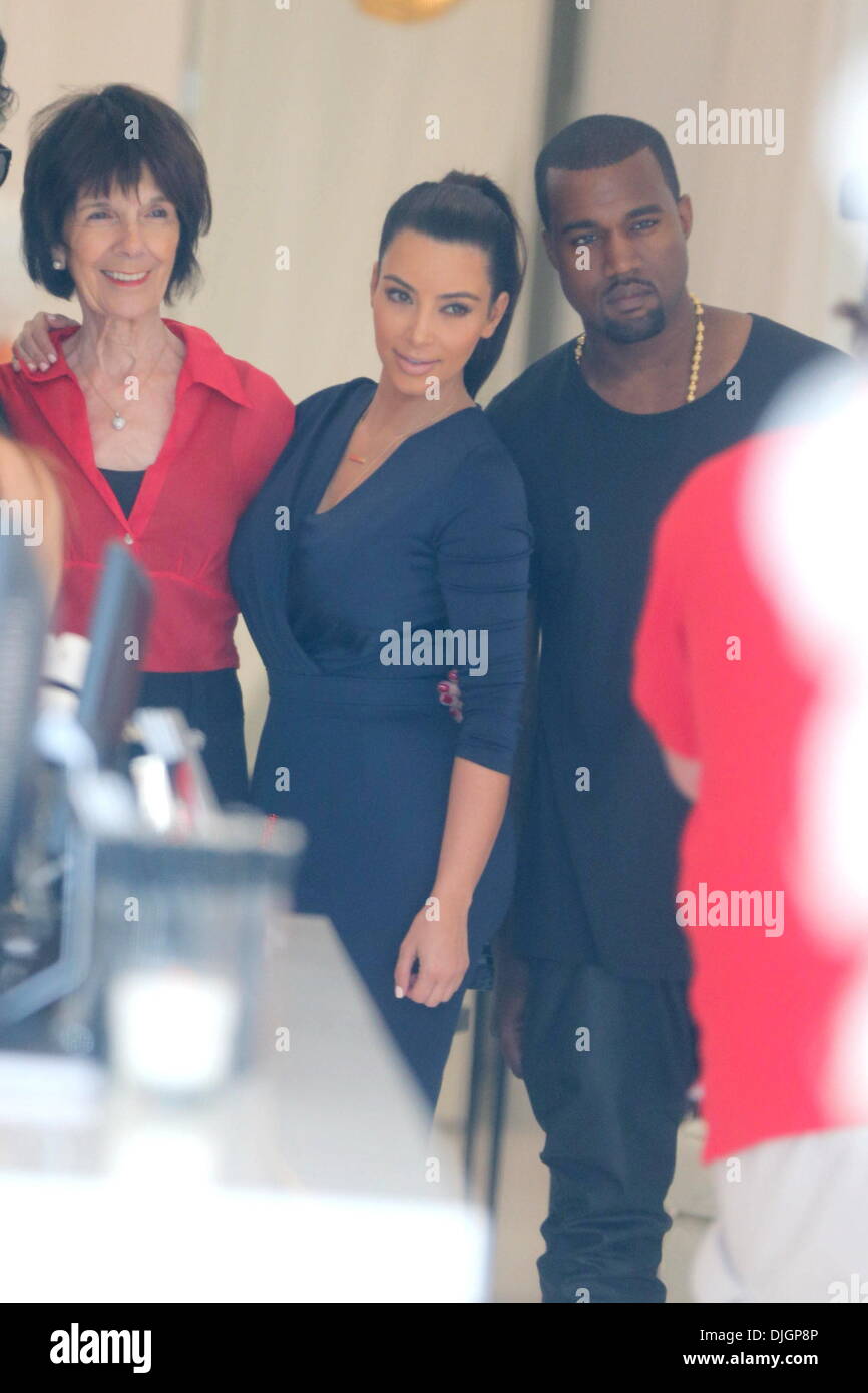 Kim Kardashian and boyfriend Kanye West attend the grand opening for
