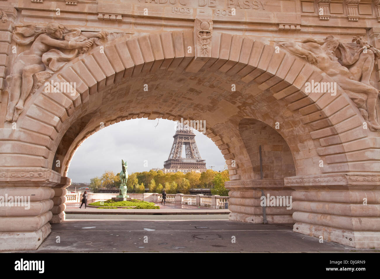 Looking through the Viaduct de Passy on Pont Bir Hakeim to the Eiffel Tower. Stock Photo