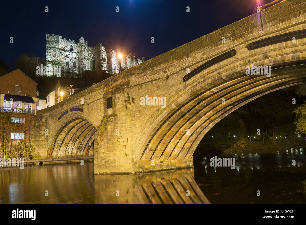 Durham City Framwellgate Bridge and castle floodlit at night north east England UK Stock Photo