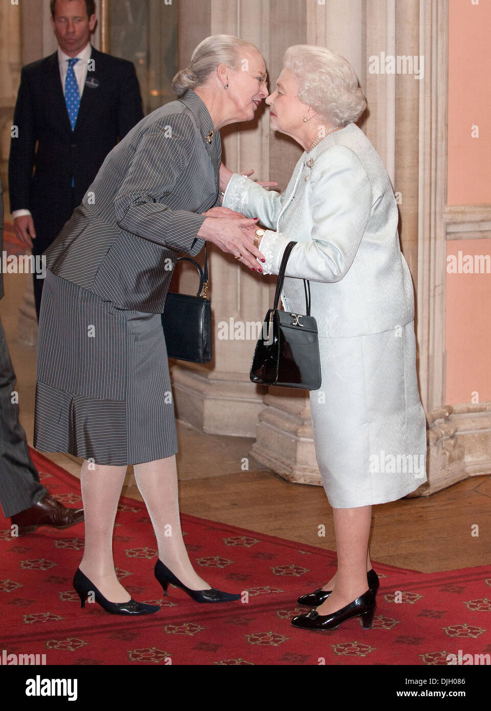 Queen Margrethe II of Denmark and Queen Elizabeth II Guests are greeted inside Grand Vestibule at Windsor Castle to attend Stock Photo