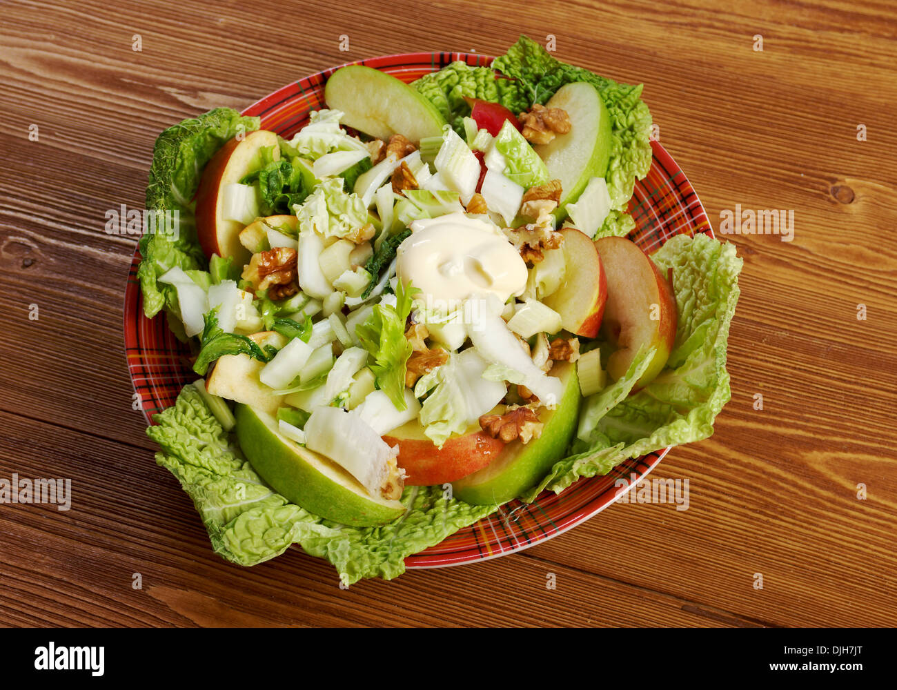 Waldorf salad made of fresh apples, celery and walnuts.farm-style Stock Photo