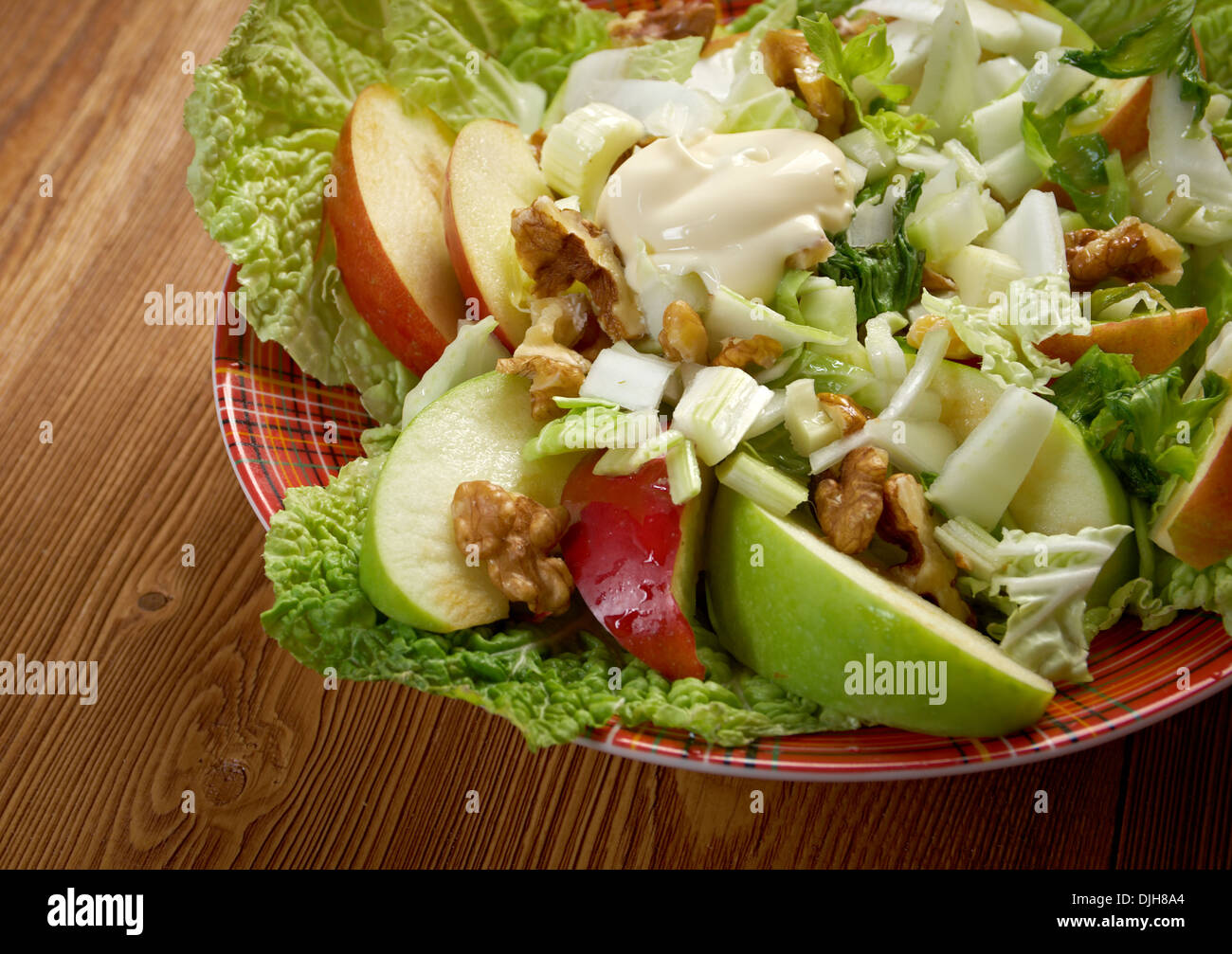 Waldorf salad made of fresh apples, celery and walnuts.farm-style Stock Photo
