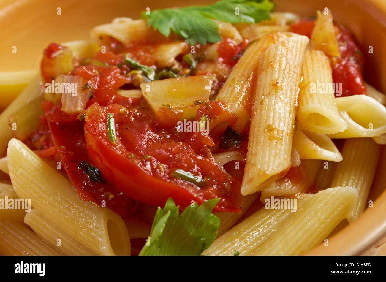 Picture of plate of penne rigata pasta with marinara sauce .farm-style Stock Photo ...