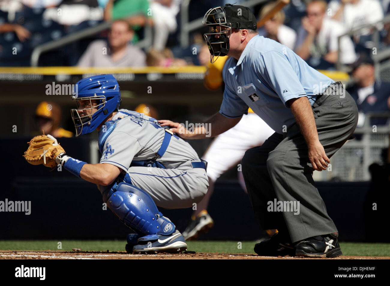 Dodgers catcher Brad Ausmus and home plate umpire Brian O'Nara behind