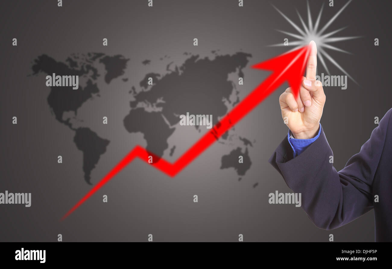 Businessman touching growing graph in studio Stock Photo - Alamy