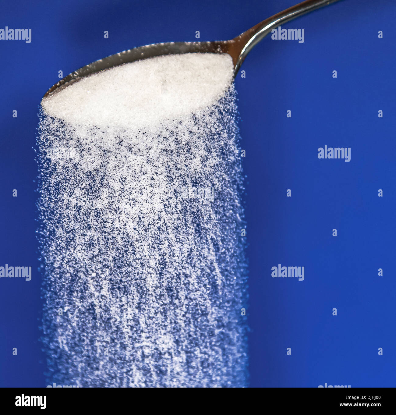 Pouring sugar Stock Photo