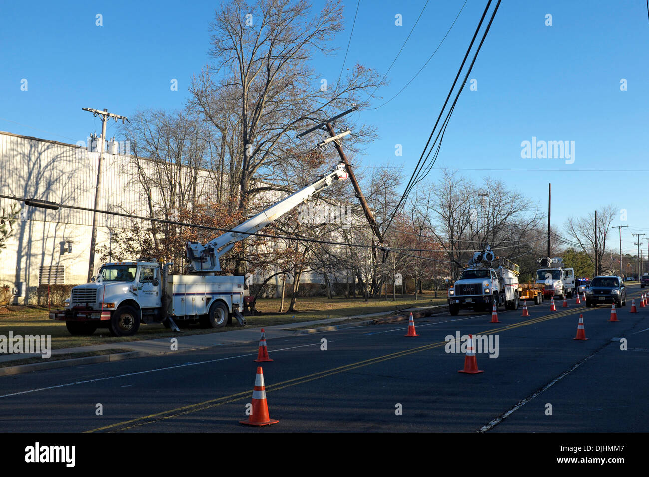 Crews Arrive to repair knocked down power pole on Thanksgiving Morning Stock Photo
