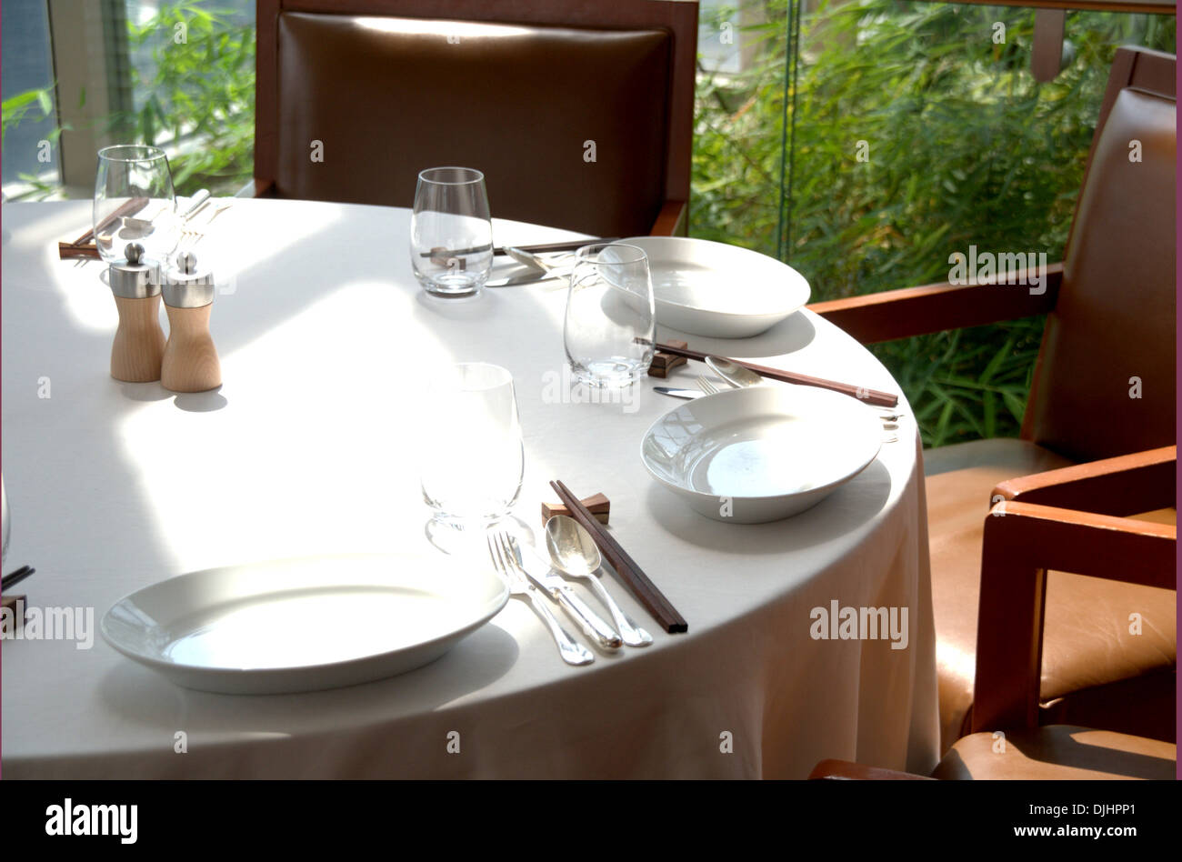 china plate and table setting in highclass restaurant Stock Photo Alamy