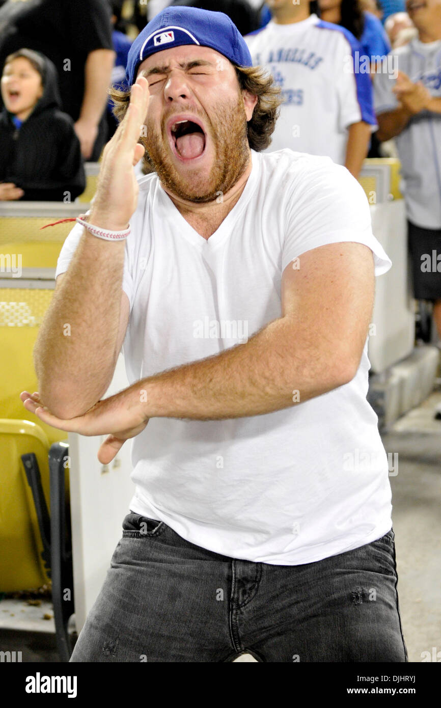 Aug. 03, 2010 - Los Angeles, California, United States of America - 3 August 2010: Dodgers fan Jameson Moss, also known as ''The Don't Stop Believing Guy'' lipsynchs in the eighth inning of the game. The San Diego Padres lost to the Los Angeles Dodgers by a score of 2-1 at Dodger Stadium in Los Angeles,. California..Mandatory Credit: Andrew Fielding / Southcreek Global (Credit Imag Stock Photo