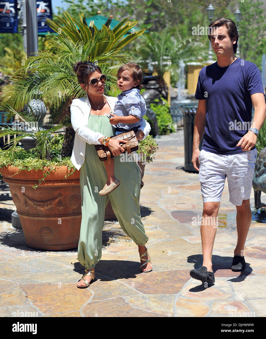 Pregnant Kourtney Kardashian enjoyed a fun afternoon at park with Scott Disick and their 2-year-old son Mason Calabasas Stock Photo