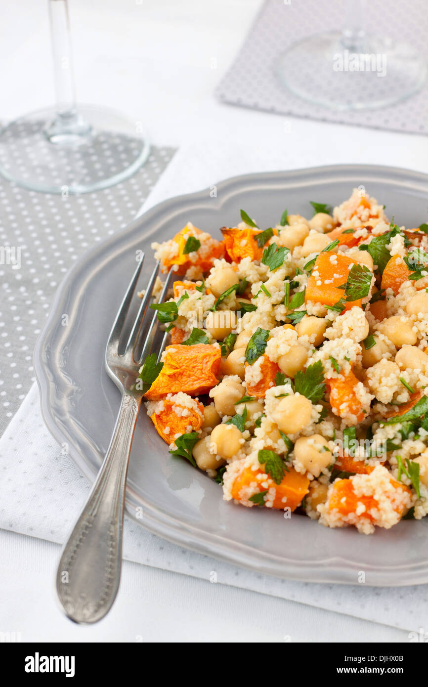 Pumpkin salad with couscous and chickpeas Stock Photo