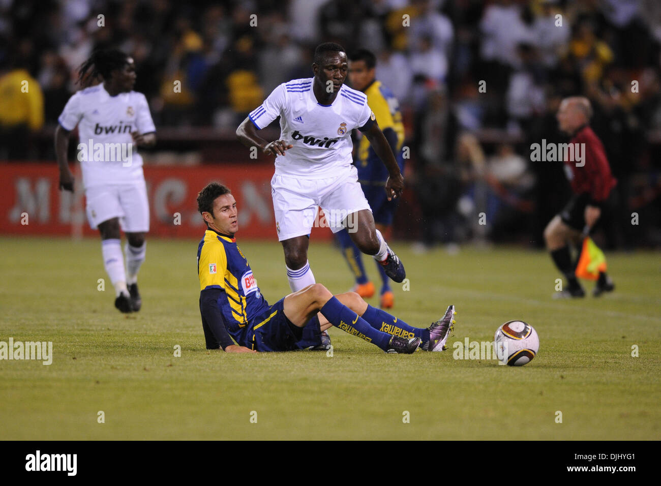 Aug. 04, 2010 - San Francisco, California, U.S - August 4, 2010: Club America M Miguel Layun (19) trips up Real Madrid M Mahamadou Diarra (6) during the friendly between Real Madrid and Club America at Candlestick Park in San Francisco, CA.  Real Madrid took the contest 3-2. (Credit Image: © Matt Cohen/Southcreek Global/ZUMApress.com) Stock Photo