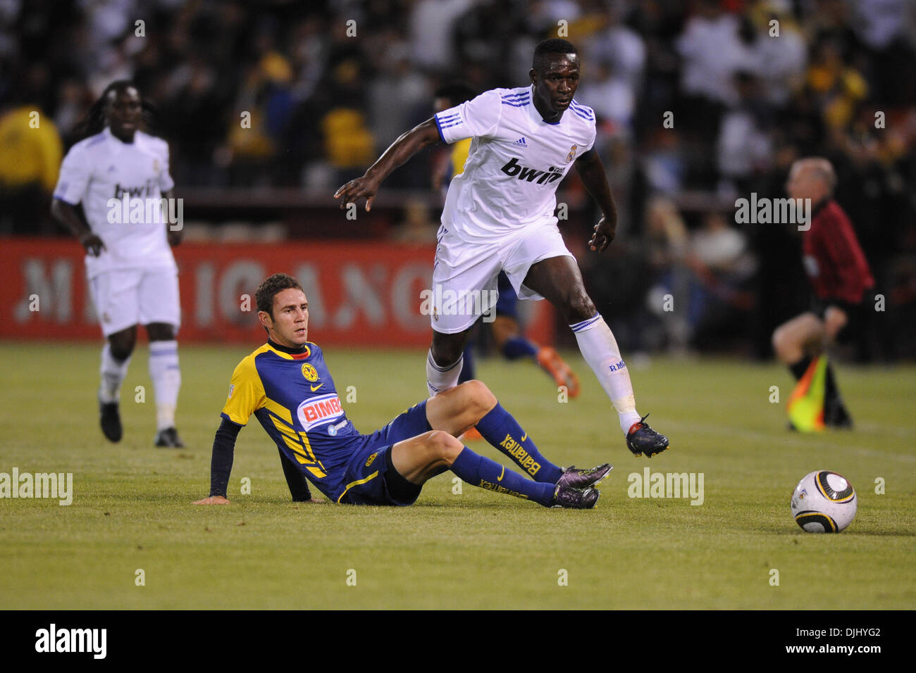 Aug. 04, 2010 - San Francisco, California, U.S - August 4, 2010: Club America M Miguel Layun (19) trips up Real Madrid M Mahamadou Diarra (6) during the friendly between Real Madrid and Club America at Candlestick Park in San Francisco, CA.  Real Madrid took the contest 3-2. (Credit Image: © Matt Cohen/Southcreek Global/ZUMApress.com) Stock Photo