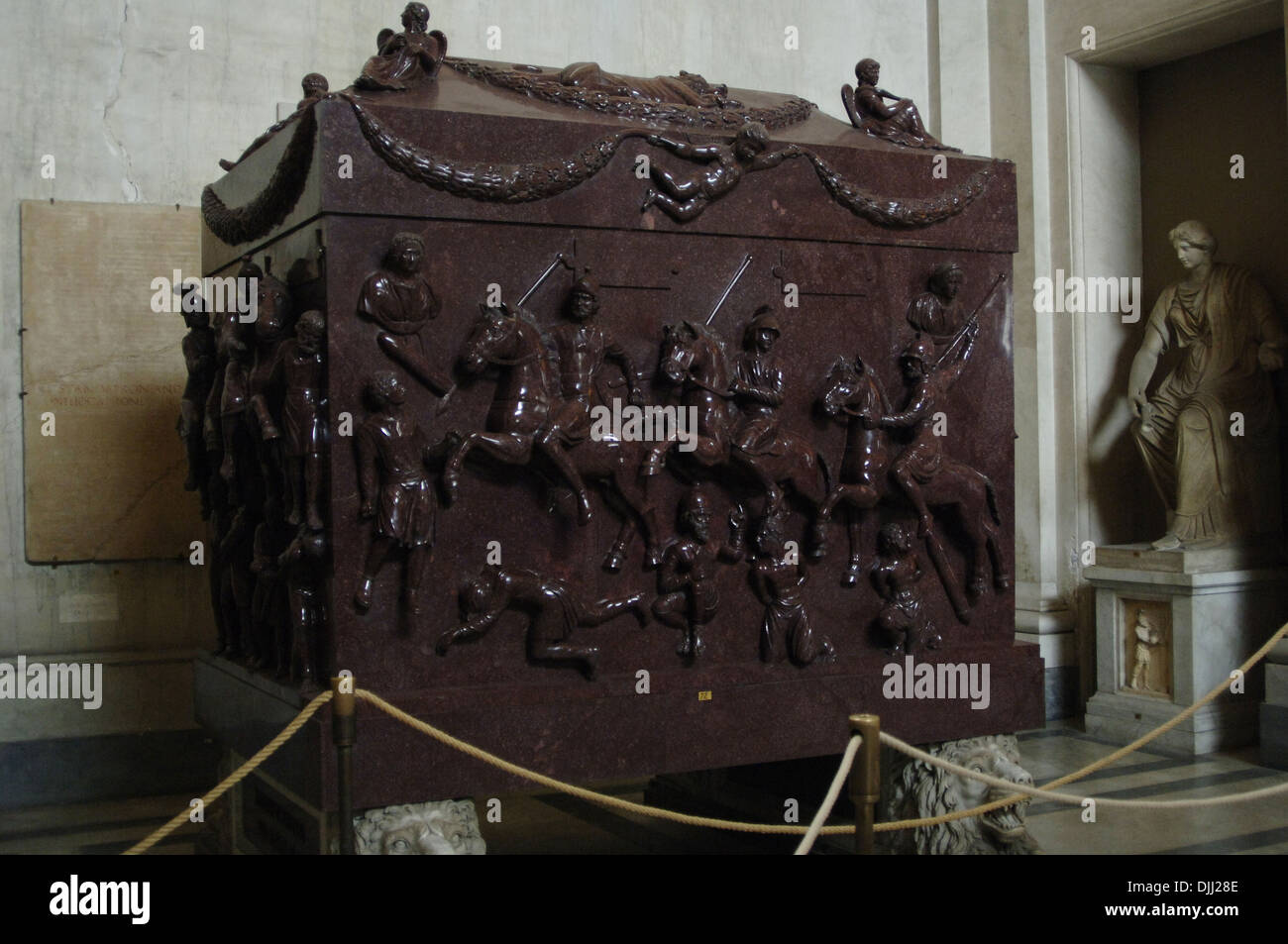 The sarcophagus of Helena. Red porphyry. Carved with military scenes with Roman soldiers on horseback and barbarian prisoners. Stock Photo