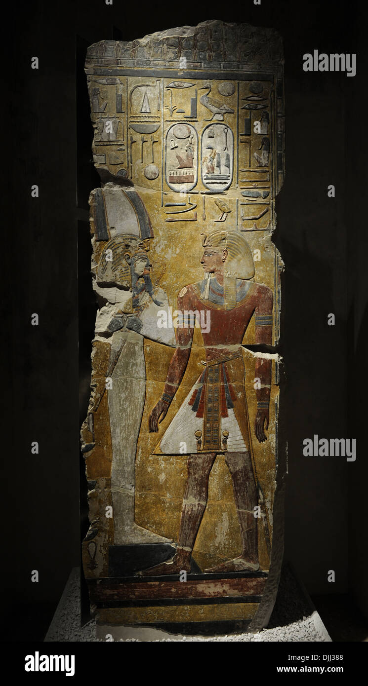 King Seti I in front of the God Osiris. Fragment of a pillar. Limestone. New Kingdom. 19th Dynasty. 1290 BC. Grave of Seti I. Stock Photo