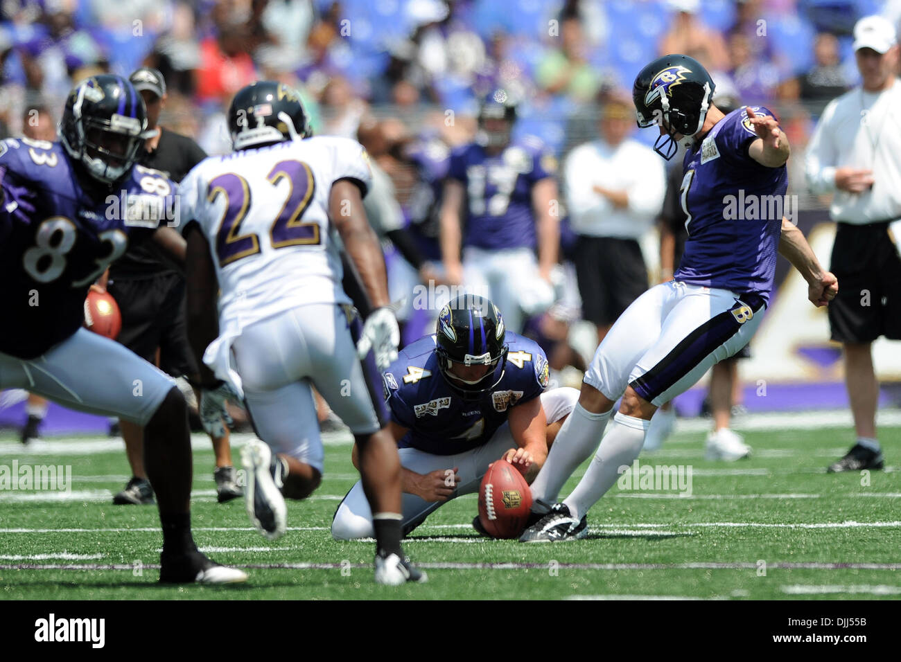 BALTIMORE, MD - SEPTEMBER 13: Baltimore Ravens punter Sam Koch (4) and  Cleveland Browns long snapper