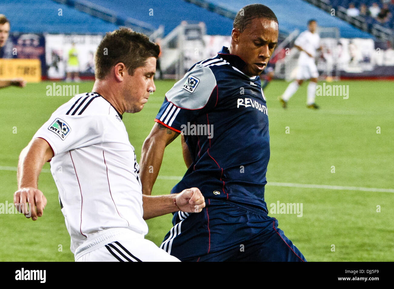Aug. 07, 2010 - Foxboro, Massachusetts, United States of America - 7  August, 2010:  D.C. United Defender DEVON MC TAVISH (18) and New England Revolution Midfielder KHANO SMITH  (18) battle for control of the ball before it goes out of bounds during second half of match play at  Gillette Stadium in Foxboro, Massachusetts.  New England Revolution defeated D.C. United 1-0..Mandatory  Stock Photo