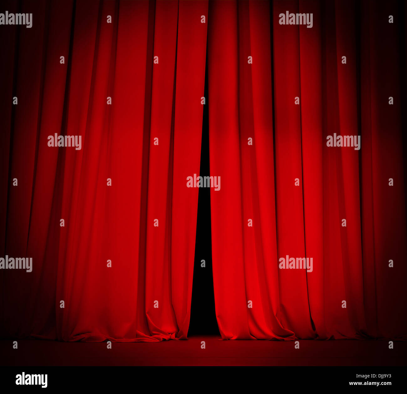 theater stage red curtain with spotlight background Stock Photo