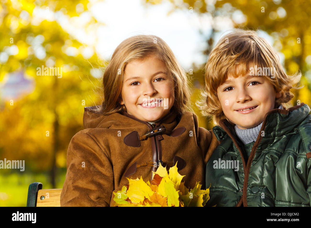 Close Portrait Of Two Smiling Blond Kids Boy And Girl Twin Siblings With Bouquet Of Leaves Stock Photo Alamy Close Portrait Of Two Smiling Blond Kids Boy And Girl Twin Siblings With Bouquet Of Leaves Stock Photo Alamy