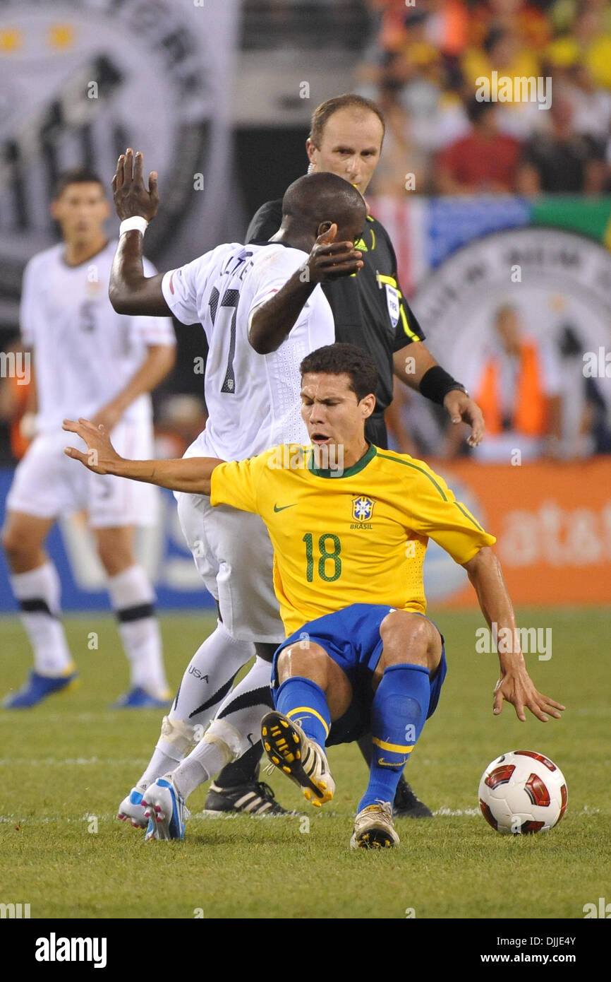 Aug. 10, 2010 - East Rutherford, New Jersey, United States of America - 10 August 2010 - Brazil Midfielder HERNANES (18) fouls USA Striker JOZY ALTIDORE (17) during the first International Friendly at The New Meadowlands Stadium in East Rutherford, New Jersey.Brazil defeat the USA 2-0. Mandatory credit: Brooks Von Arx, Jr./Southcreek Global. (Credit Image: © Southcreek Global/ZUMAp Stock Photo