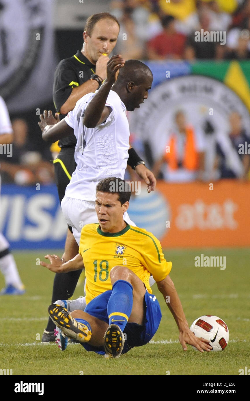 Aug. 10, 2010 - East Rutherford, New Jersey, United States of America - 10 August 2010 - Brazil Midfielder HERNANES (18) fouls USA Striker JOZY ALTIDORE (17) during the first International Friendly at The New Meadowlands Stadium in East Rutherford, New Jersey.Brazil defeat the USA 2-0. Mandatory credit: Brooks Von Arx, Jr./Southcreek Global. (Credit Image: © Southcreek Global/ZUMAp Stock Photo