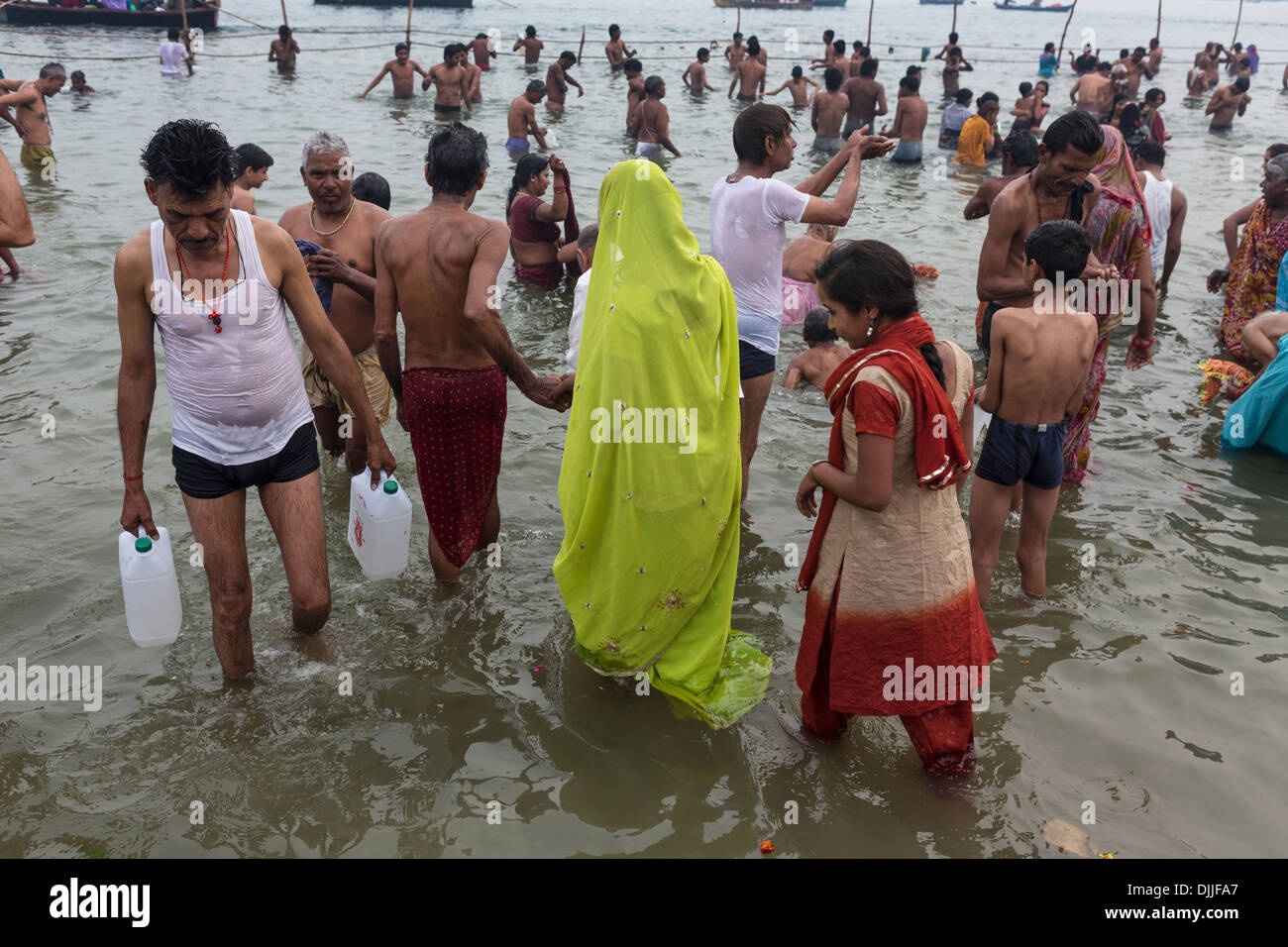 Groups of Hindu believers take bath in the Ganges river to continue the tradition of Kumbhamela Stock Photo