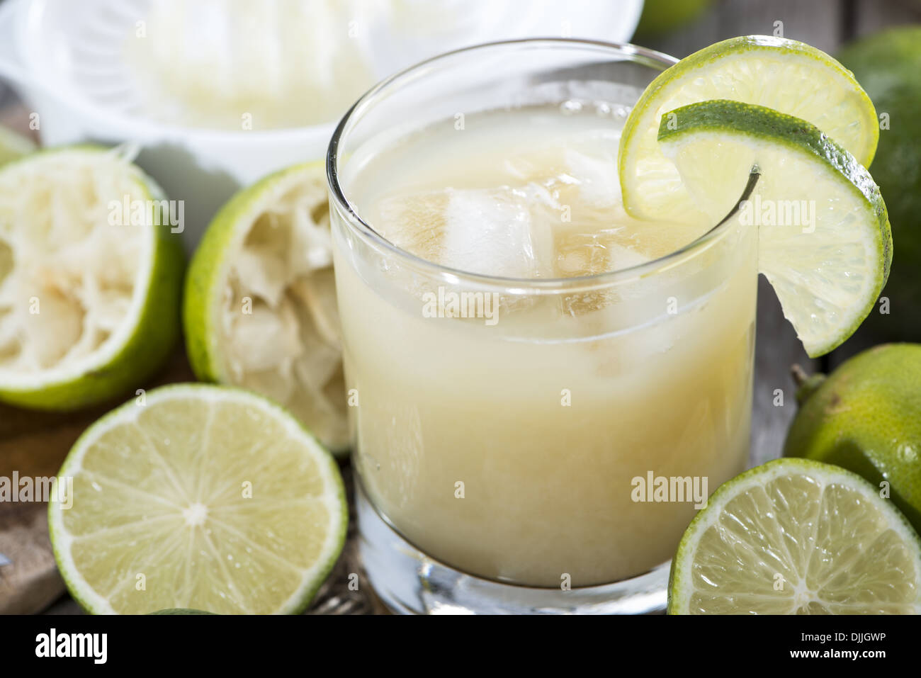 Glass filled with fresh made Lime Juice Stock Photo Alamy