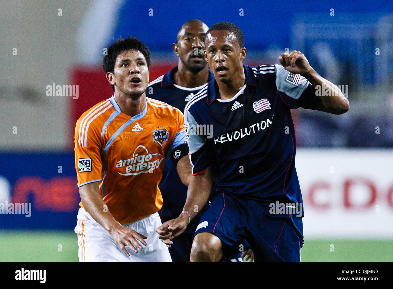 Aug. 14, 2010 - Foxboro, Massachusetts, United States of America - 14  August, 2010:  New England Revolution Midfielder Khano Smith (18) and Houston Dynamo Forward Brian Ching  (25) fight for position before a corner kick during match play at  Gillette Stadium in Foxboro, Massachusetts.  The New England Revolution defeated the Houston Dynamo 1-0..Mandatory Credit: Mark Box / Southc Stock Photo