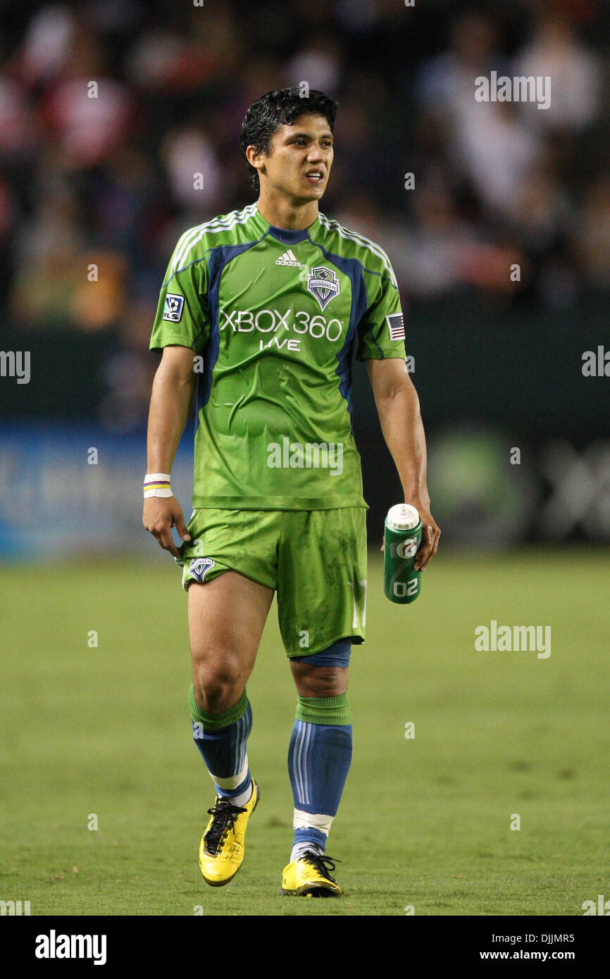 Aug. 14, 2010 - Carson, California, United States of America - 14 August 2010: Seattle Sounders FC forward (#17) FREDY MONTERO shakes off a mid air collision between himself and Zach Thornton during the Chivas USA vs Seattle Sounders game at the Home Depot Center in Carson, California. The Sounders went on to tie Chivas USA with a final score of 0-0. Mandatory Credit: Brandon Parry Stock Photo