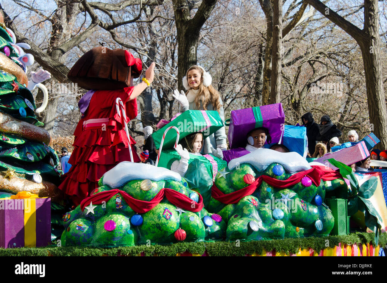 NEW YORK, NY, USA, Nov. 28, 2013. Ariana Grande waves from the Dora the Explorer  float in the 87th Annual Macy’s Thanksgiving Day Parade. Credit:  Jennifer Booher/Alamy Live News Stock Photo