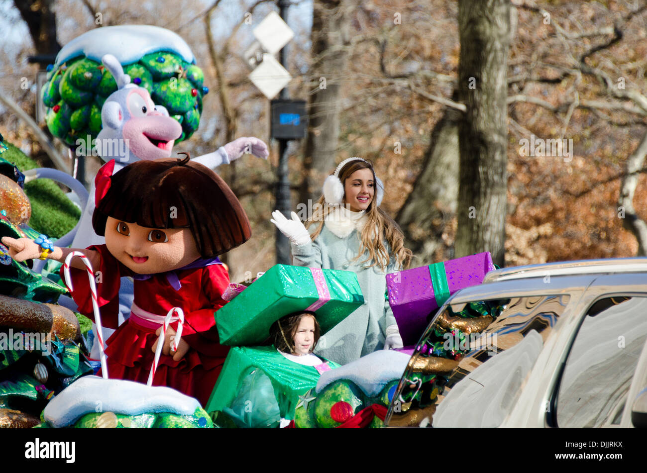 NEW YORK, NY, USA, Nov. 28, 2013. Ariana Grande waves from the Dora the Explorer float in the 87th Annual Macy’s Thanksgiving Day Parade. Credit:  Jennifer Booher/Alamy Live News Stock Photo