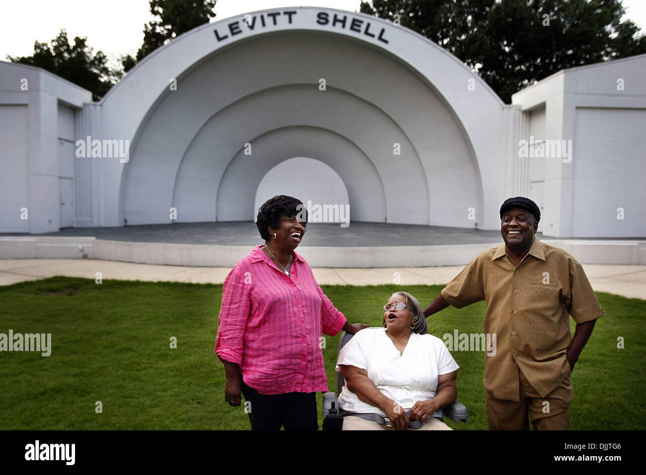 Aug. 19, 2010 - Memphis, TN, U.S. - August 19, 2010 - (left to right)  Johnnie Turner, Katie Mallory, and Evander Ford reminisce at scene of their ''crime,'' attending a whites only church youth rally  at the Overton Park Shell on August 30, 1960. Ford led a group of 13 black college students into the event, where they were arrested by Memphis police. The friends chat about their e Stock Photo