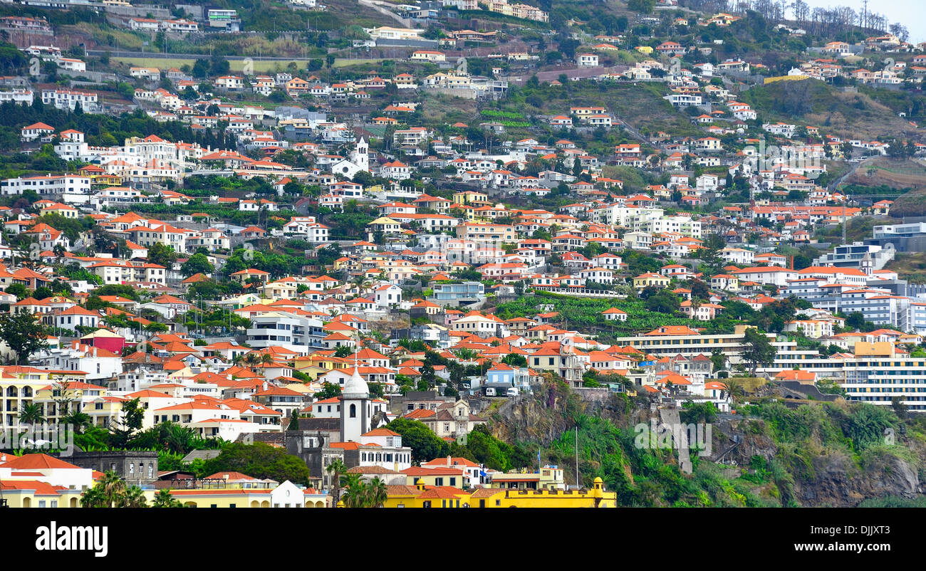 Funchal Madeira. Churches, houses and buildings stretching up into the hills Stock Photo