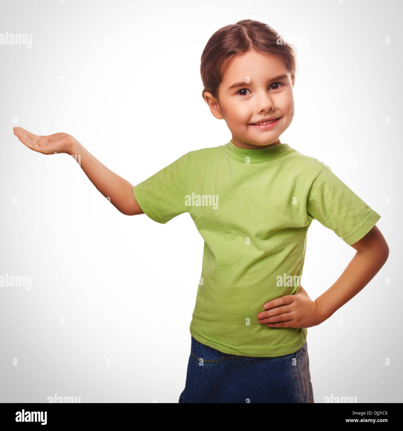 little girl holding an open palm empty hand isolated on white background emotion. Stock Photo