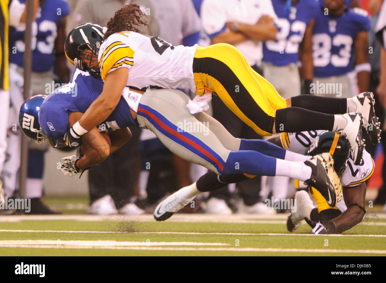 Carolina Panthers Charles Godfrey watches New York Giants Steve