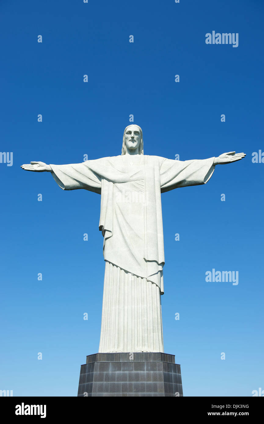Corcovado Christ the Redeemer stands full length in blue sky Rio de Janeiro Brazil Stock Photo