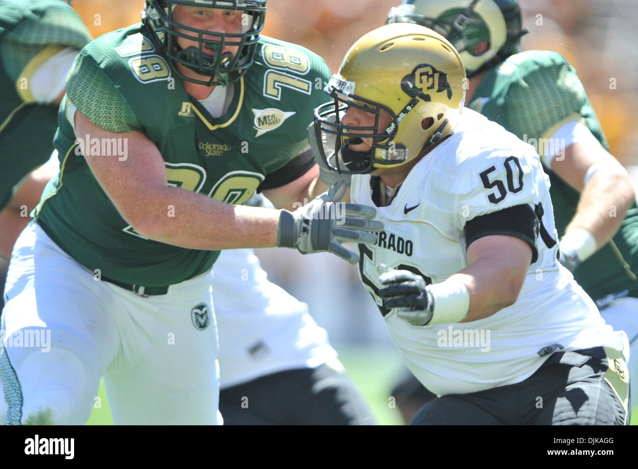 Sep. 04, 2010 - Denver, Colorado, United States of America - Colorado State Rams offensive linesman Paul Madsen (76) fights in the trenches with Colorado Buffaloes defensive tackle Curtis Cunningham (50). During Rocky Mountain Showdown game between the Colorado State Rams and the Colorado Buffaloes at Invesco Field at Mile High. Colorado leads Colorado State at the half by a score  Stock Photo