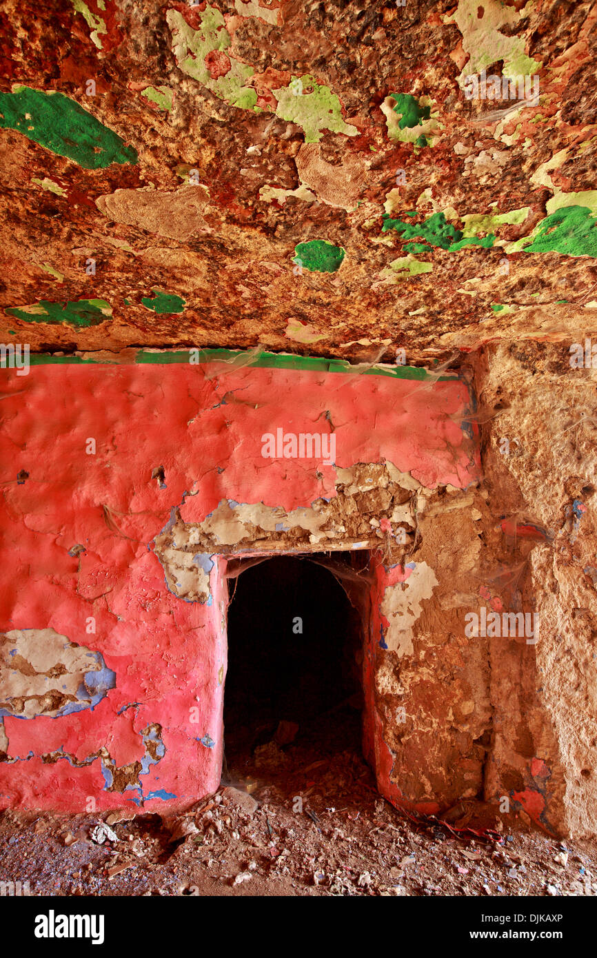 Rock-cut 'cavehouses' below (and inside) the castle of Didymoteicho town, Evros, Thraki, Greece. Stock Photo