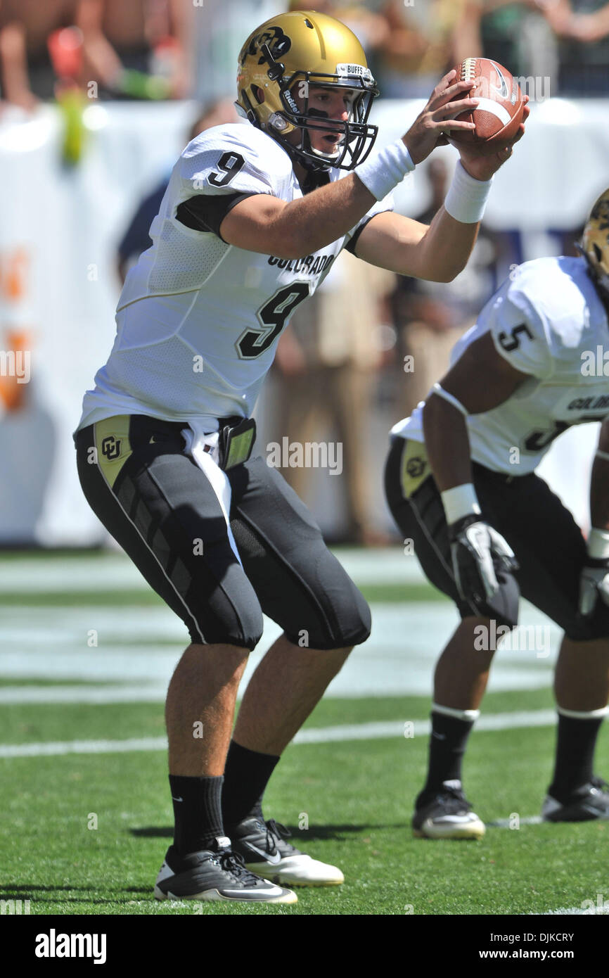 Sep. 04, 2010 - Denver, Colorado, United States of America - Colorado Buffaloes quarterback Tyler Hansen (9) receives a snap during Rocky Mountain Showdown game between the Colorado State Rams and the Colorado Buffaloes at Invesco Field at Mile High. Colorado defeated Colorado State by a score of 24-3. (Credit Image: © Andrew Fielding/Southcreek Global/ZUMApress.com) Stock Photo