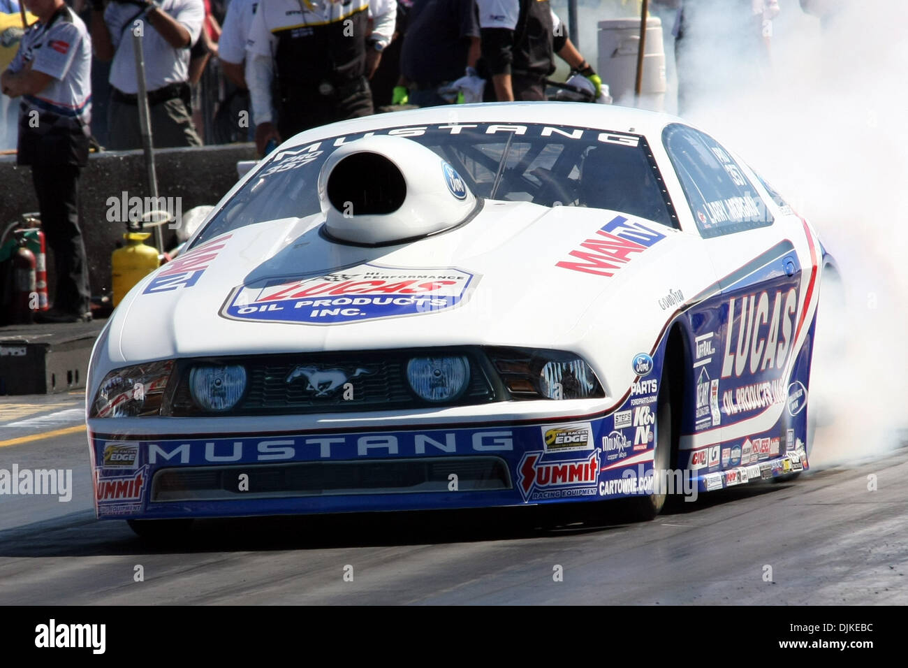Sept. 4, 2010 - Indianapolis, Indiana, United States of America - 04 September2010: Larry Morgan does a burnout in his Ford Mustang. The U.S. Nationals were held at O'Reilly Raceway Park in Indianapolis, Indiana. (Credit Image: © Alan Ashley/Southcreek Global/ZUMApress.com) Stock Photo