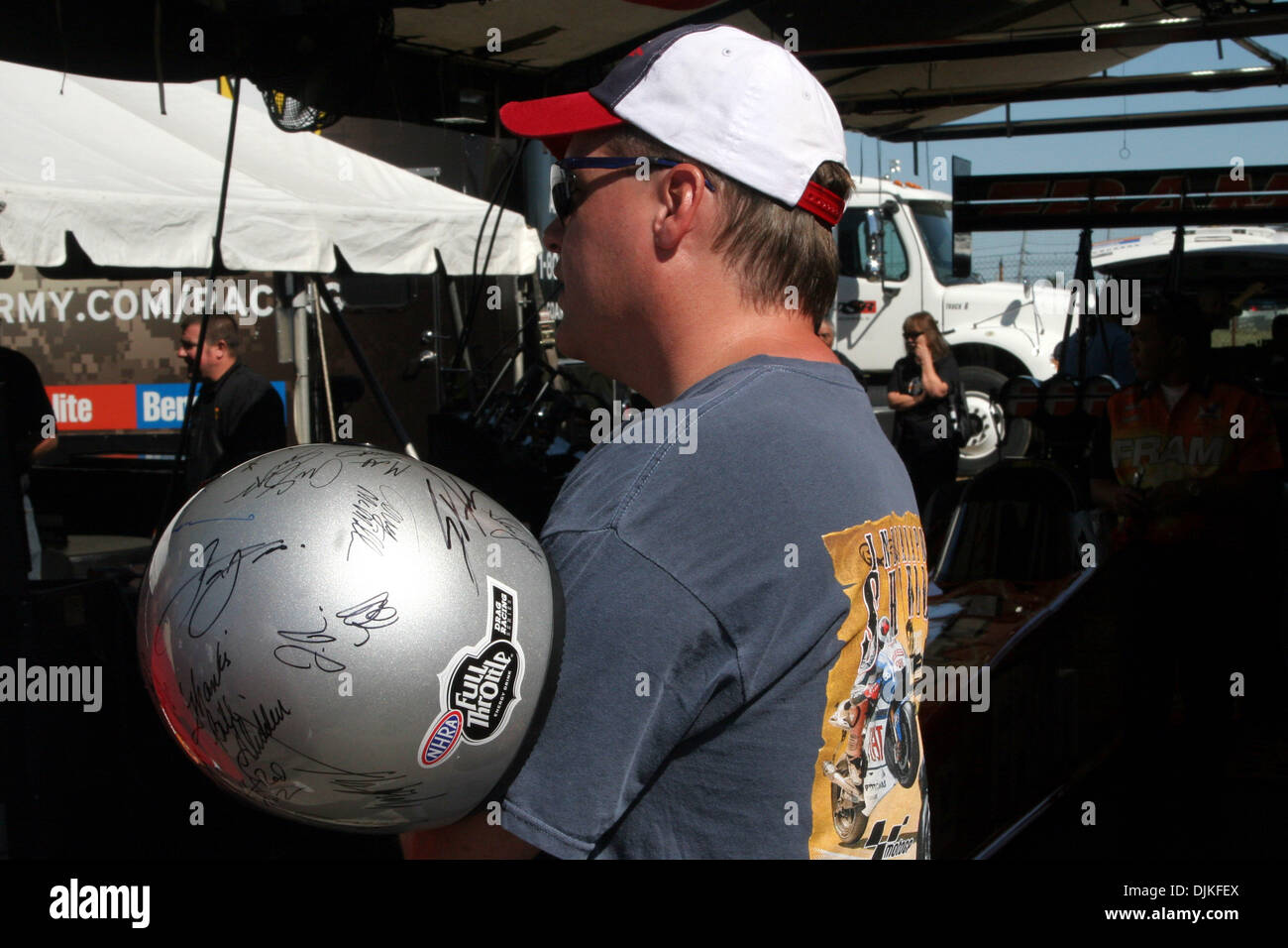 Sep. 05, 2010 - Indianapolis, Indiana, United States of America - 05 September 2010: A fan holds a helmet covered with autographs. The Mac Tools U.S. Nationals were held at O'Reilly Raceway Park in Indianapolis, Indiana. (Credit Image: © Alan Ashley/Southcreek Global/ZUMApress.com) Stock Photo