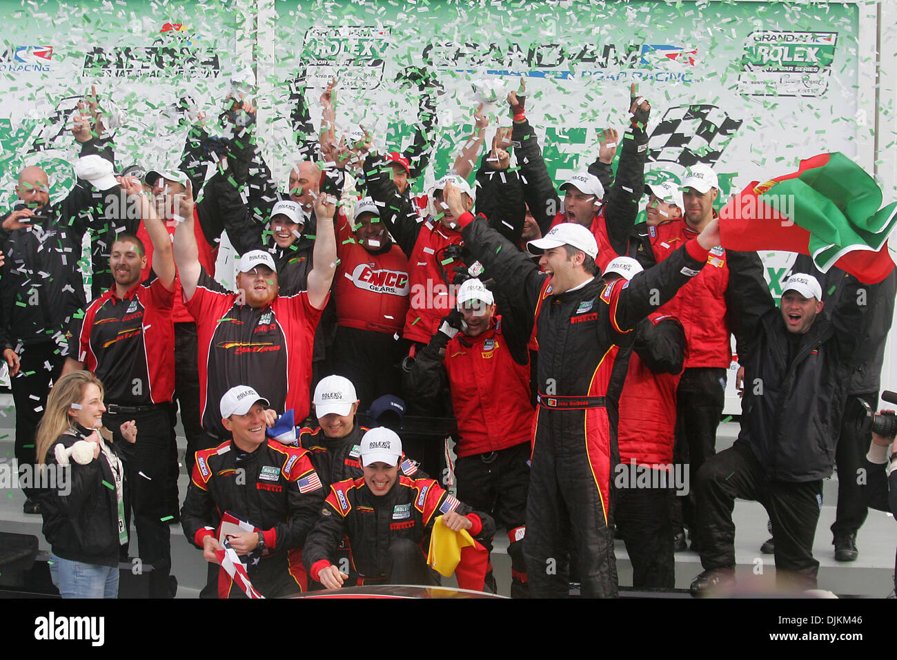Members of the overall winning Action Express Racing team celebrate its ...
