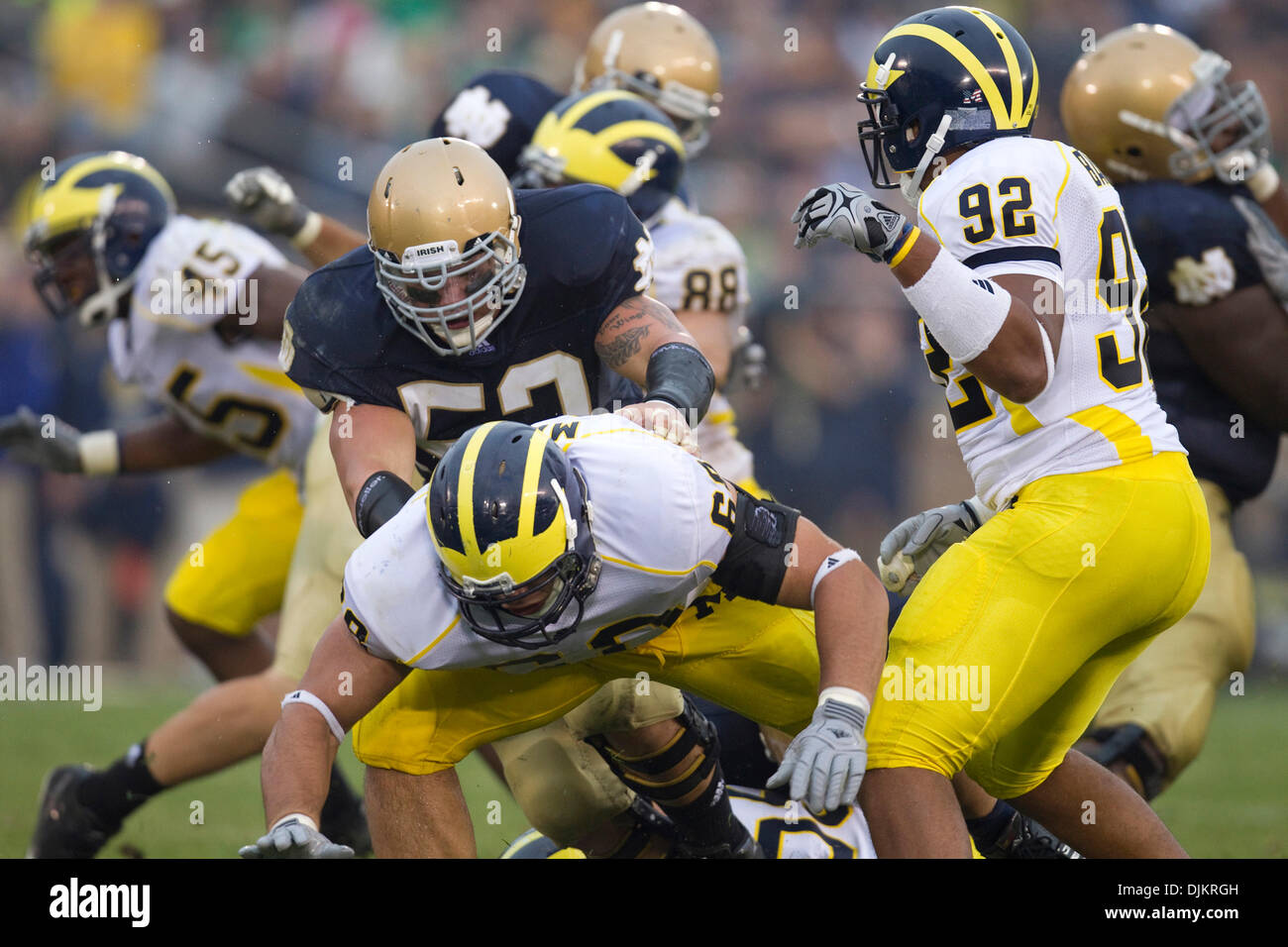 Sept. 11, 2010 - South Bend, Indiana, United States of America - Notre Dame center Braxston Cave (#52) blocks Michigan defensive tackle Alex Schwab (#68) during NCAA football game between the Notre Dame Fighting Irish and the Michigan Wolverines.  Michigan defeated Notre Dame 28-24 in game at Notre Dame Stadium in South Bend, Indiana. (Credit Image: © John Mersits/Southcreek Global Stock Photo