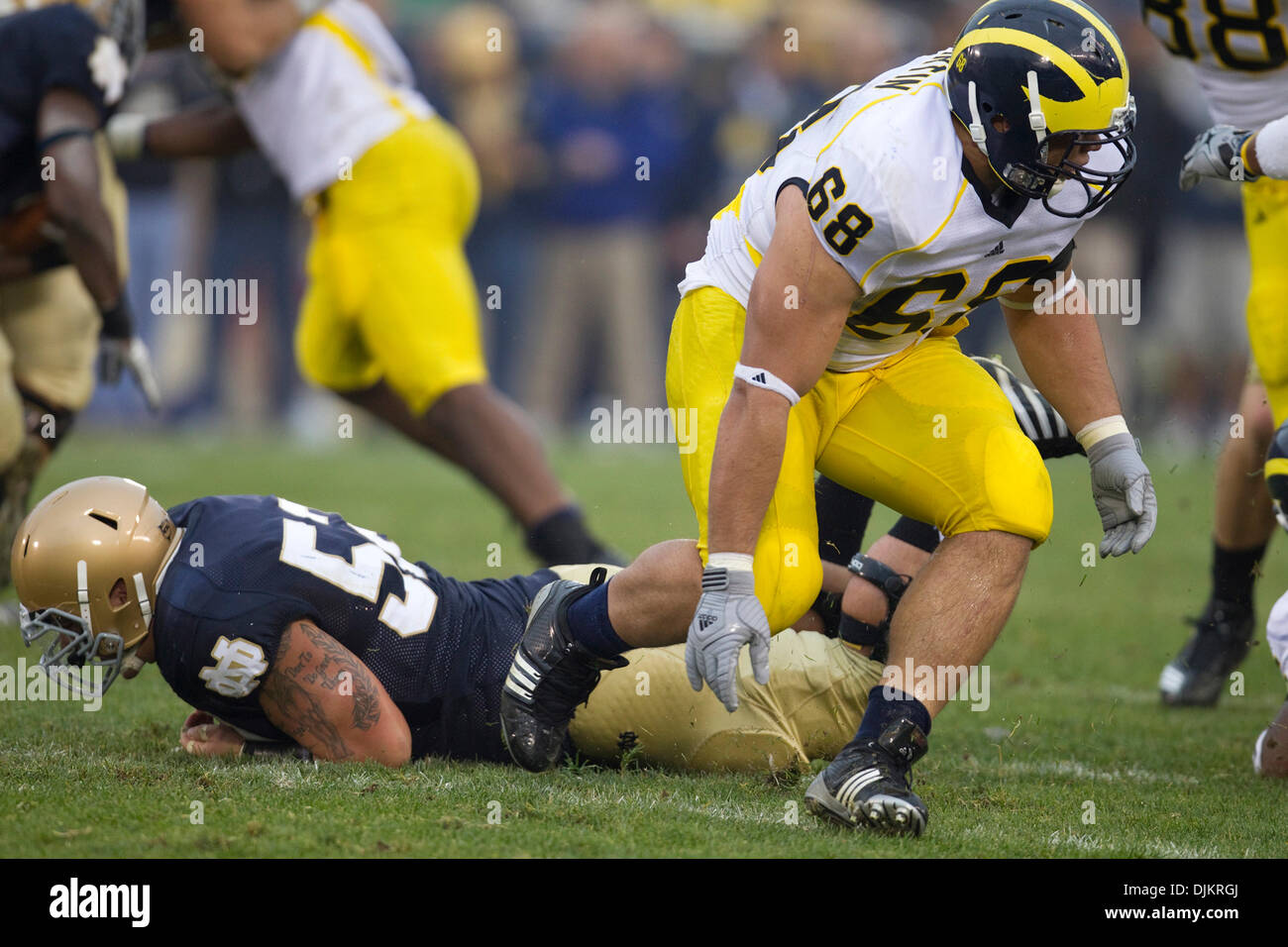 Sept. 11, 2010 - South Bend, Indiana, United States of America - Notre Dame center Braxston Cave (#52) and Michigan defensive tackle Alex Schwab (#68) during NCAA football game between the Notre Dame Fighting Irish and the Michigan Wolverines.  Michigan defeated Notre Dame 28-24 in game at Notre Dame Stadium in South Bend, Indiana. (Credit Image: © John Mersits/Southcreek Global/ZU Stock Photo