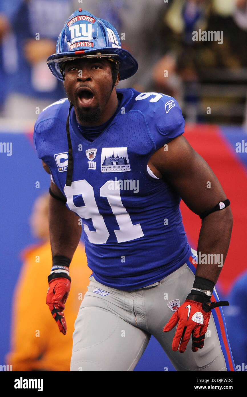 New York Giants defensive end Justin Tuck (91) during player introductions  before NFL action between the New York Giants and the Carolina Panthers at  New Meadowlands Stadium in East Rutherford, New Jersey.