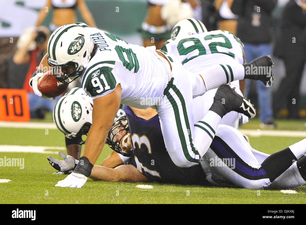 Sept. 13, 2010 - East Rutherford, New Jersey, United States of America - New York Jets defensive tackle Sione Pouha (91) recovers a fumble at New Meadowlands Stadium in East Rutherford New Jersey (Credit Image: © Brooks Van Arx/Southcreek Global/ZUMApress.com) Stock Photo