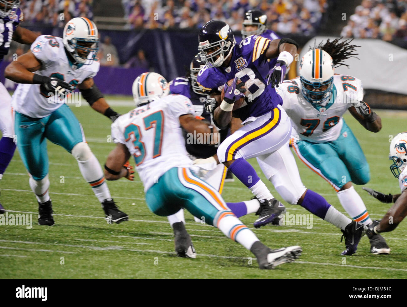 Adrian Peterson #28 of the Minnesota Vikings rushes Stock Photo