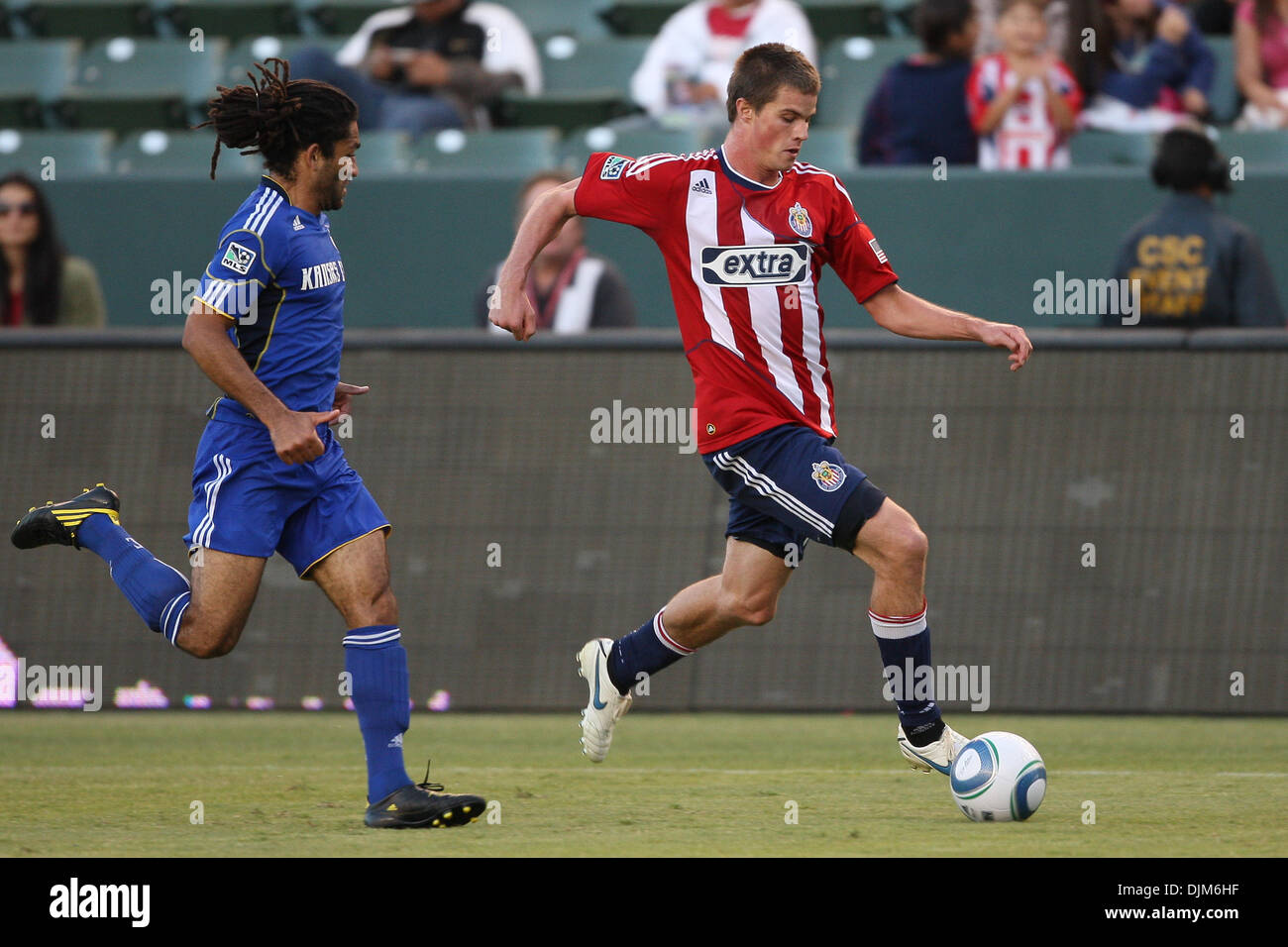 Sept. 19, 2010 - Carson, California, United States of America - Chivas USA forward (#17) Justin Braun (R) tries to pull away from Kansas City Wizards midfielder (#8) Stephane Auvray (L) during the Chivas USA vs Wizards game at the Home Depot Center. The Kansas City Wizards went on to defeat Club Depotivo Chivas USA with a final score of 2-0. (Credit Image: © Brandon Parry/Southcree Stock Photo