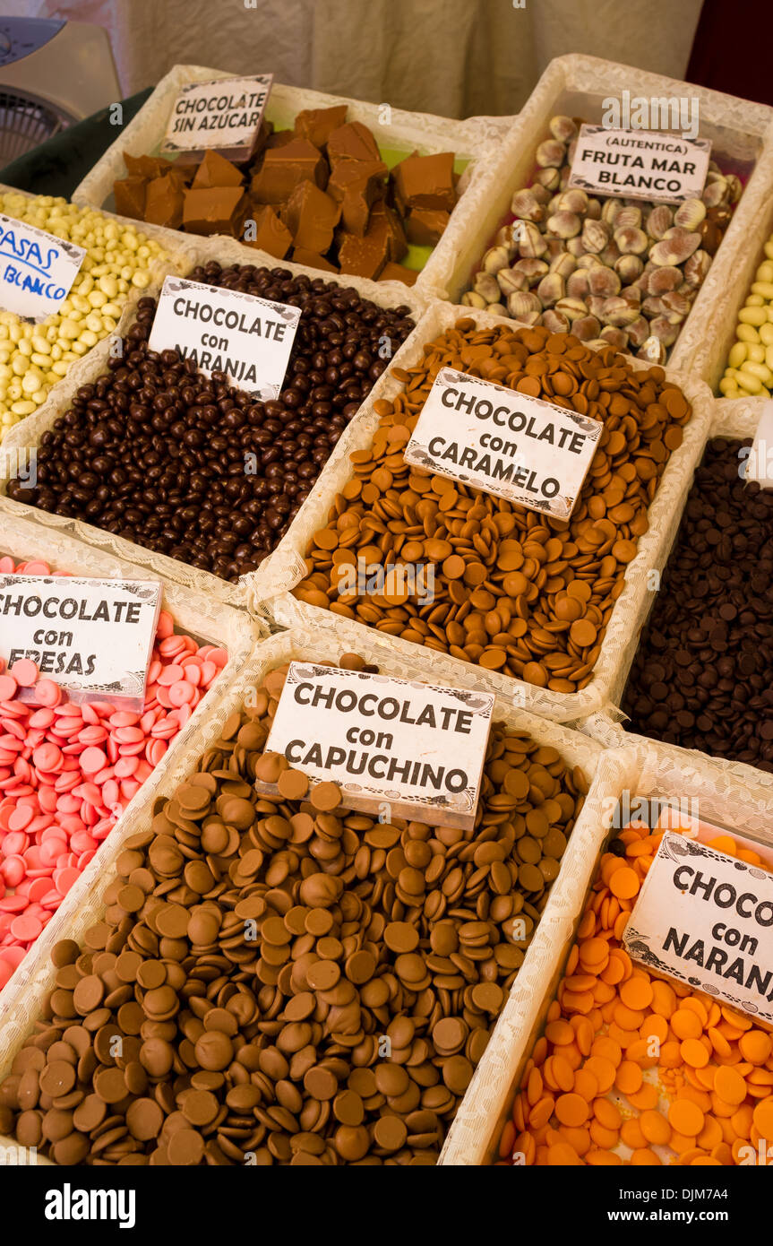 Assorted chocolate on a street market stall Stock Photo - Alamy